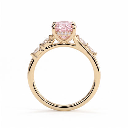 Fancy Vivid Pink oval lab-grown diamond hidden halo engagement ring with marquise accents in 14K (585) yellow gold, side profile showing the hidden halo 