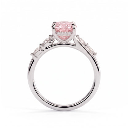 Fancy Vivid Pink oval lab-grown diamond hidden halo engagement ring with marquise accents in 950 platinum, side profile showing the hidden halo 