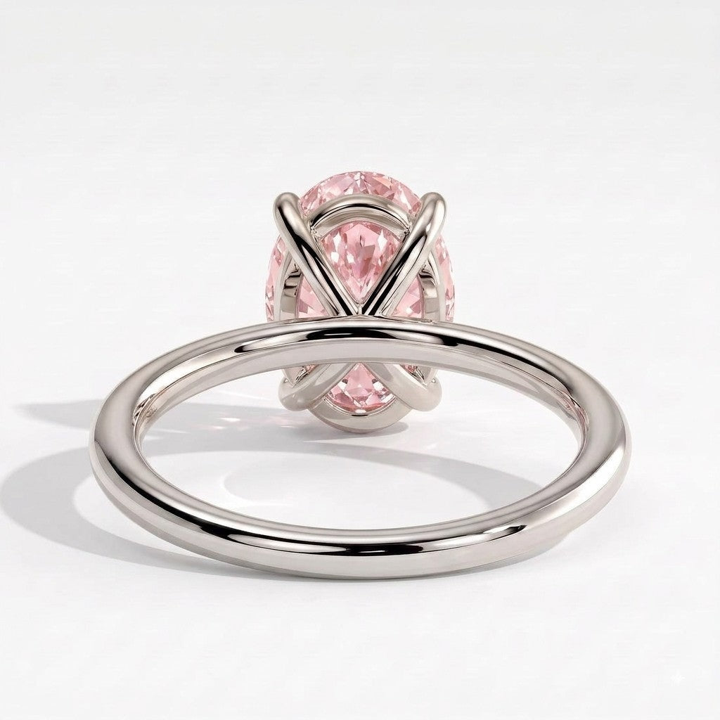 Fancy Vivid Pink oval lab-grown diamond solitaire engagement ring in 14K (585) white gold, on white background 