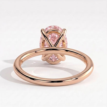 Fancy Vivid Pink oval lab-grown diamond solitaire engagement ring in 18K (750) rose gold, on white background 