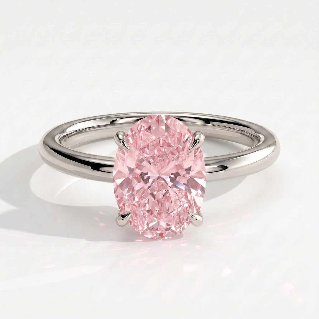 Fancy Vivid Pink oval lab-grown diamond solitaire engagement ring in 950 platinum, front view 