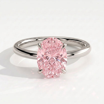 Fancy Vivid Pink oval lab-grown diamond solitaire engagement ring in 950 platinum, front view 