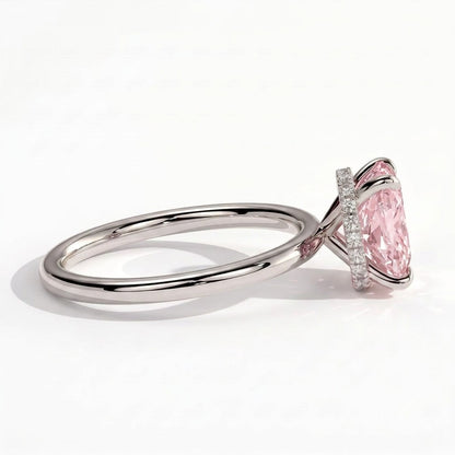 Fancy Vivid Pink elongated cushion lab-grown diamond engagement ring with wrap-around hidden halo in 14K (585) white gold, detail view of the wrap-around hidden halo 
