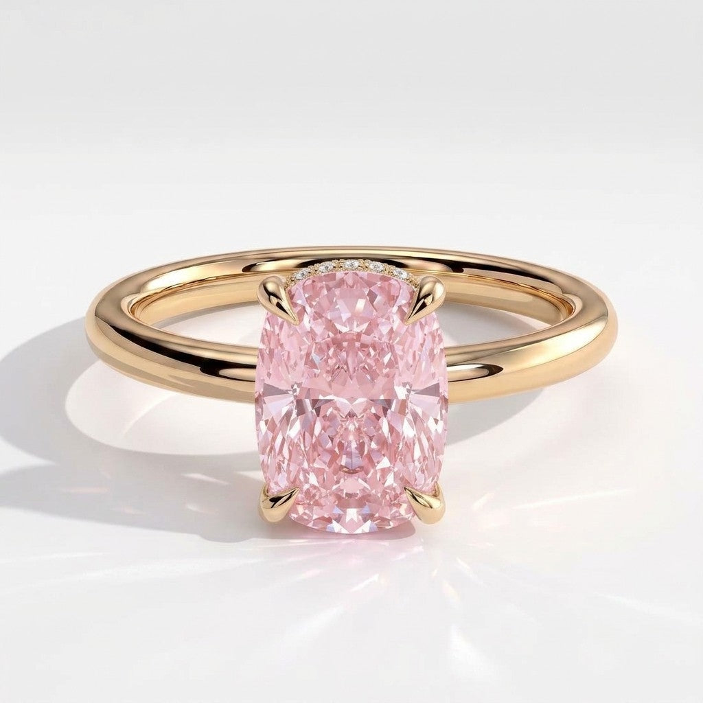 Fancy Vivid Pink elongated cushion lab-grown diamond engagement ring with wrap-around hidden halo in 18K (750) yellow gold, front view 