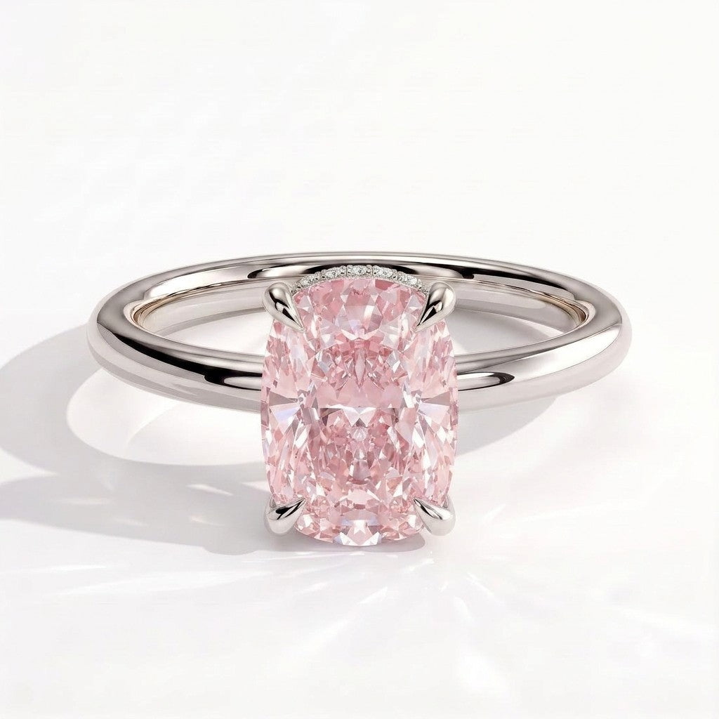 Fancy Vivid Pink elongated cushion lab-grown diamond engagement ring with wrap-around hidden halo in 950 platinum, front view 