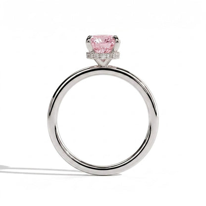 Fancy Vivid Pink elongated cushion lab-grown diamond engagement ring with wrap-around hidden halo in 950 platinum, side profile showing the hidden halo 