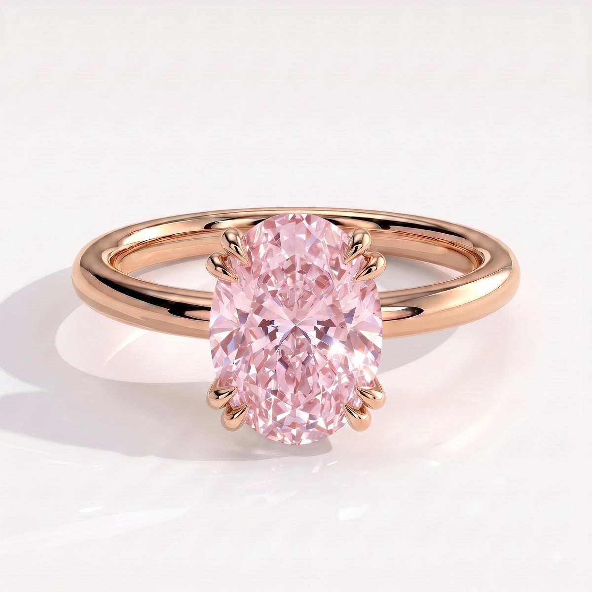 Fancy Vivid Pink oval lab-grown diamond double claw engagement ring with hidden halo in 14K (585) rose gold, front view 