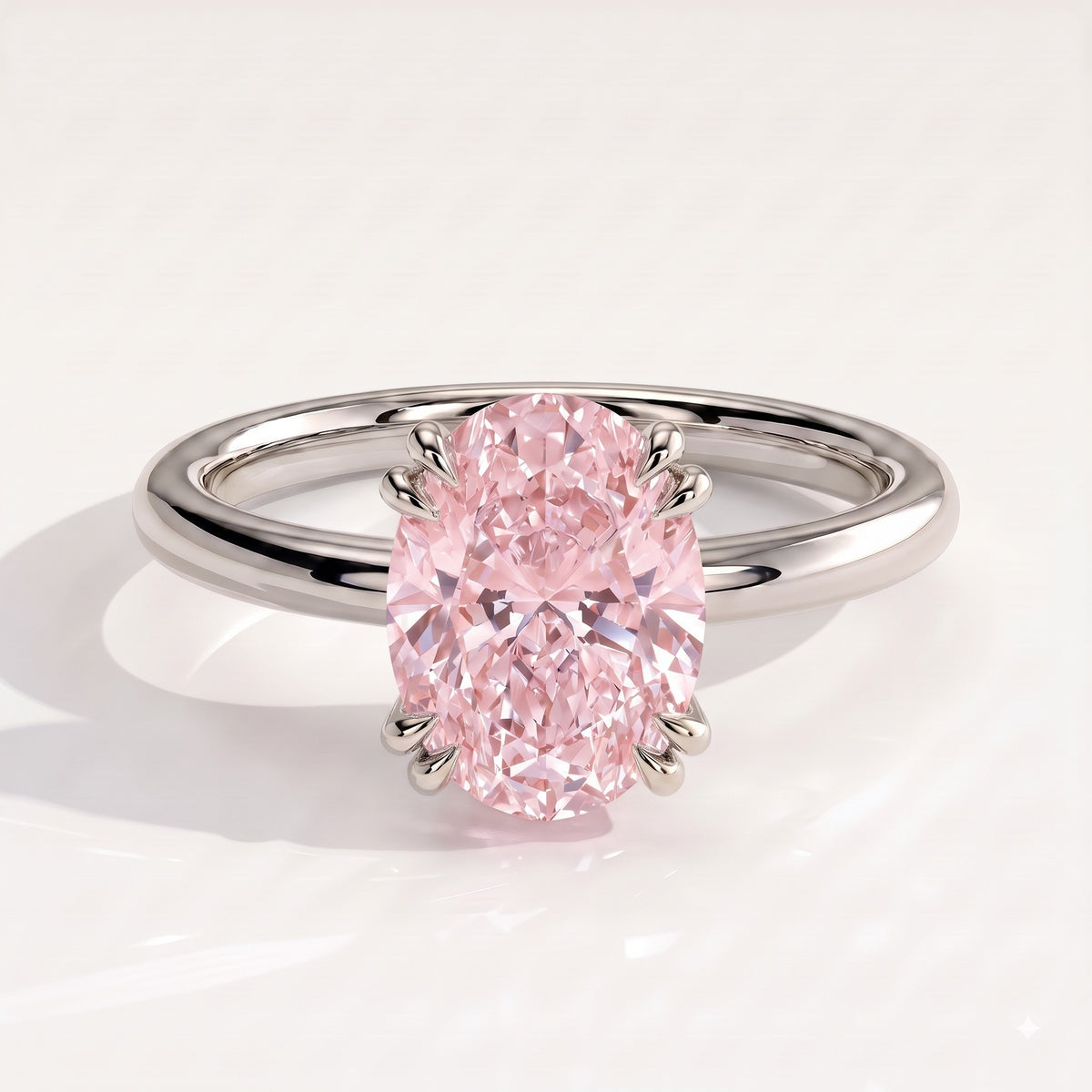 Fancy Vivid Pink oval lab-grown diamond double claw engagement ring with hidden halo in 14K (585) white gold, front view 