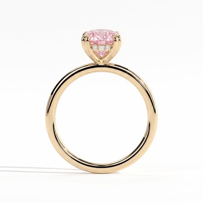 Fancy Vivid Pink oval lab-grown diamond double claw engagement ring with hidden halo in 14K (585) yellow gold, side profile showing the hidden halo 