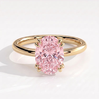 Fancy Vivid Pink oval lab-grown diamond double claw engagement ring with hidden halo in 18K (750) yellow gold, front view 