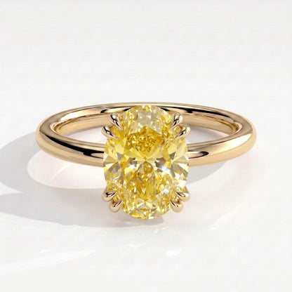 Fancy Vivid Yellow oval lab-grown diamond double claw engagement ring with hidden halo in 14K (585) yellow gold, front view 