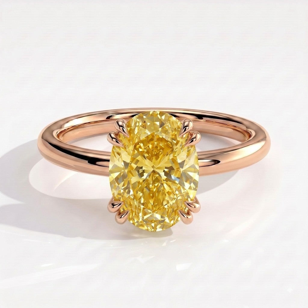 Fancy Vivid Yellow oval lab-grown diamond double claw engagement ring with hidden halo in 18K (750) rose gold, front view 