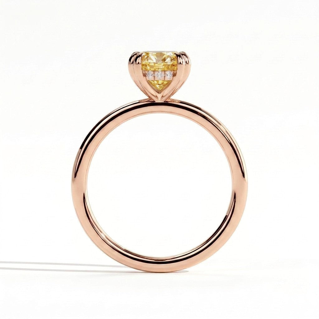 Fancy Vivid Yellow oval lab-grown diamond double claw engagement ring with hidden halo in 18K (750) rose gold, side profile showing the hidden halo 
