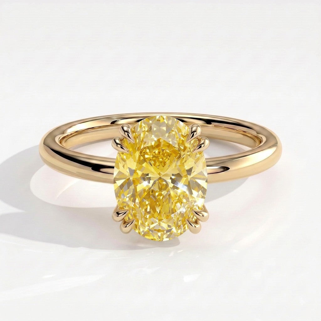 Fancy Vivid Yellow oval lab-grown diamond double claw engagement ring with hidden halo in 18K (750) yellow gold, front view 