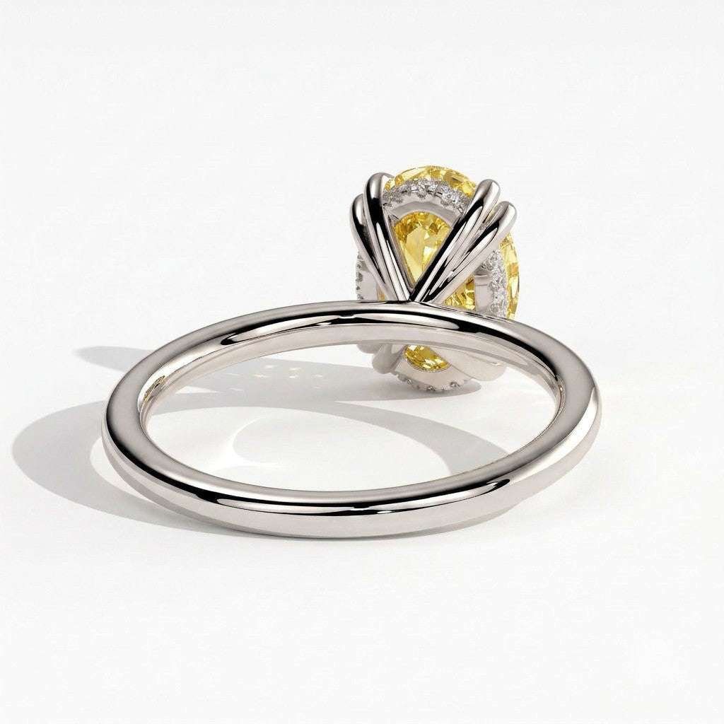 Fancy Vivid Yellow oval lab-grown diamond double claw engagement ring with hidden halo in 950 platinum, back view 
