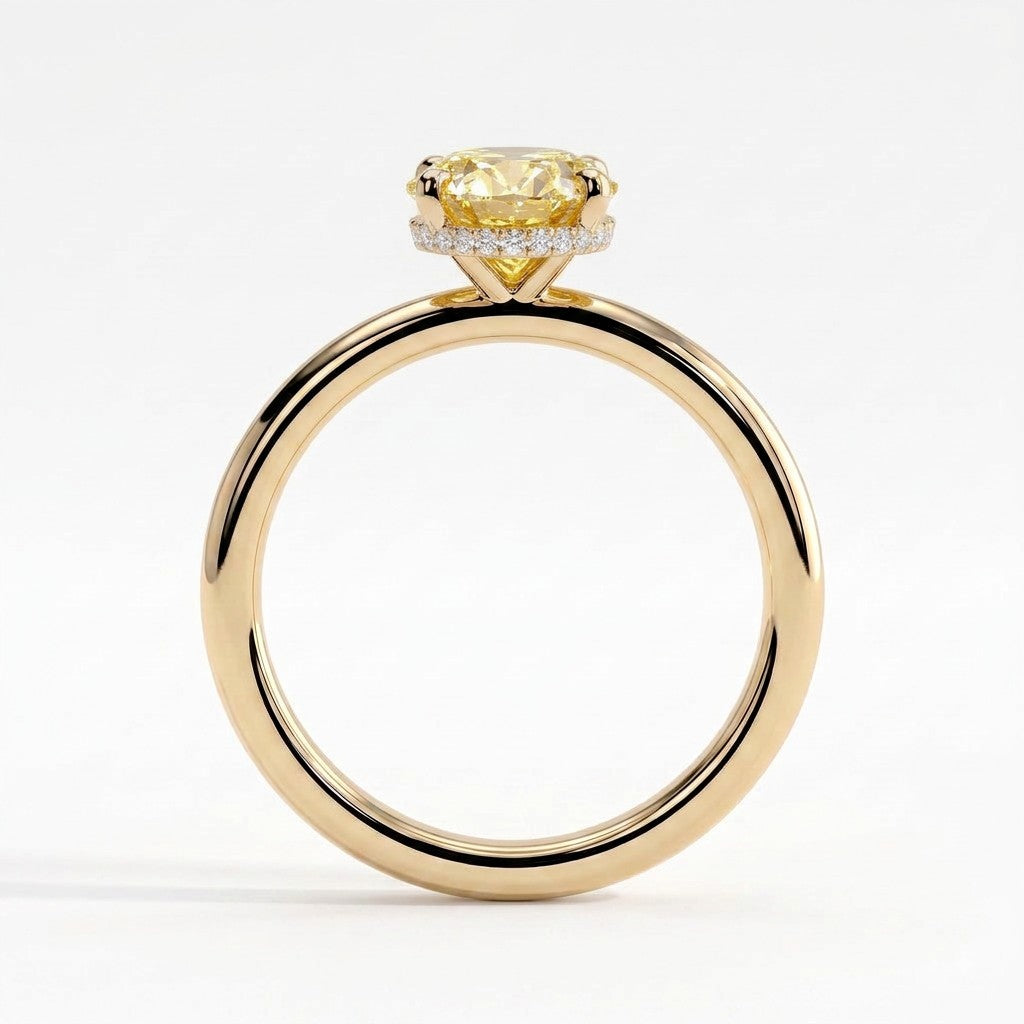 Fancy Vivid Yellow oval lab-grown diamond engagement ring with wrap-around hidden halo in 14K (585) yellow gold, side profile showing the hidden halo 