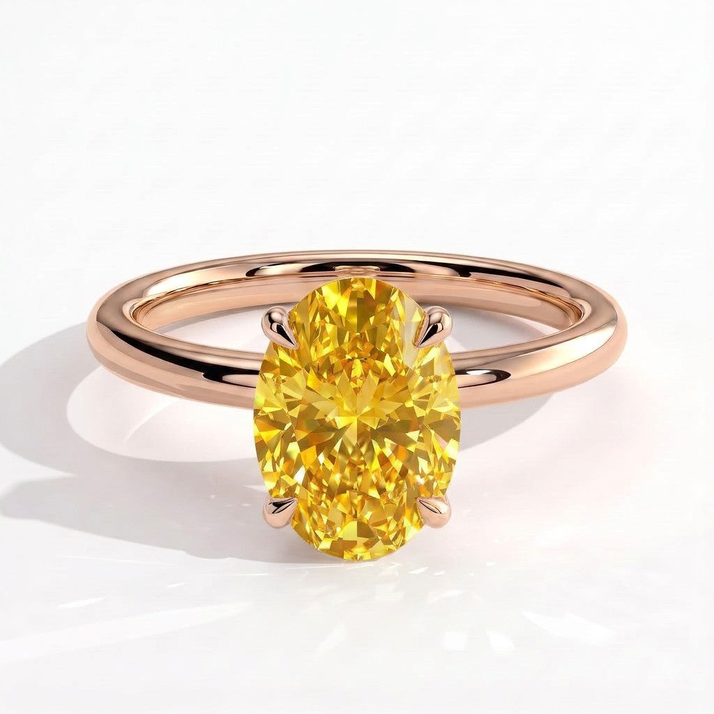 Fancy Vivid Yellow oval lab-grown diamond engagement ring with wrap-around hidden halo in 18K (750) rose gold, front view 