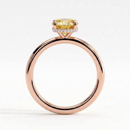 Fancy Vivid Yellow oval lab-grown diamond engagement ring with wrap-around hidden halo in 18K (750) rose gold, side profile showing the hidden halo 