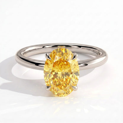 Fancy Vivid Yellow oval lab-grown diamond engagement ring with wrap-around hidden halo in 18K (750) white gold, front view 