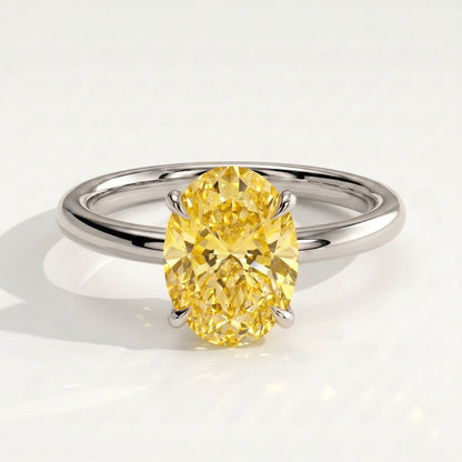 Fancy Vivid Yellow oval lab-grown diamond solitaire engagement ring in 14K (585) white gold, front view 