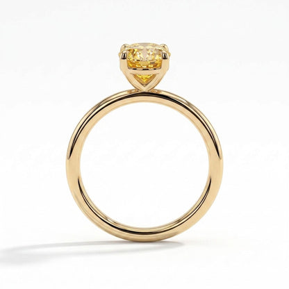 Fancy Vivid Yellow oval lab-grown diamond solitaire engagement ring in 14K (585) yellow gold, side profile 