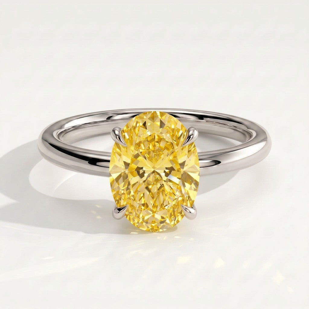 Fancy Vivid Yellow oval lab-grown diamond solitaire engagement ring in 18K (750) white gold, front view 