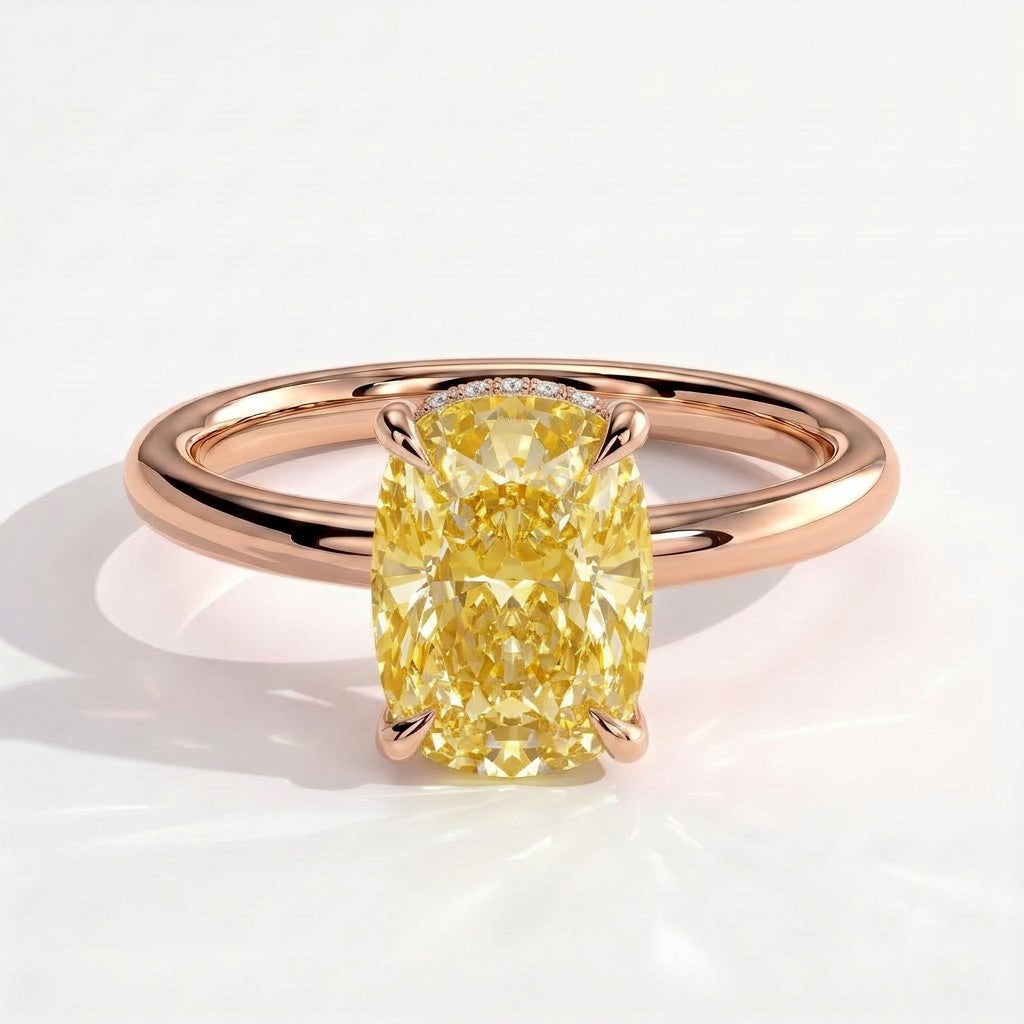 Fancy Vivid Yellow elongated cushion lab-grown diamond engagement ring with wrap-around hidden halo in 14K (585) rose gold, front view 