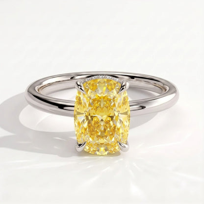 Fancy Vivid Yellow elongated cushion lab-grown diamond engagement ring with wrap-around hidden halo in 950 platinum, front view 