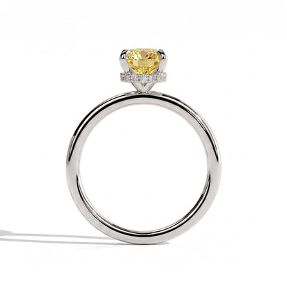 Fancy Vivid Yellow elongated cushion lab-grown diamond engagement ring with wrap-around hidden halo in 950 platinum, side profile showing the hidden halo 