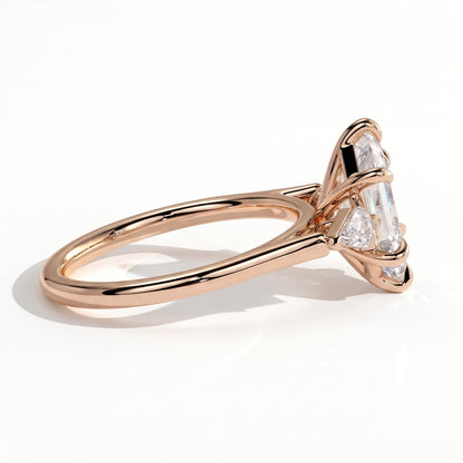 Elongated Hexagon lab-grown diamond three-stone engagement ring in 14K (585) rose gold, detail view 