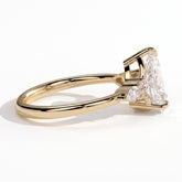 Pear lab-grown diamond halo engagement ring in 18K (750) yellow gold, detail view 